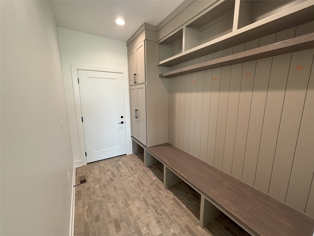 3034 NW Beechwood Dr, Grimes, IA 50111 - mudroom featuring recessed lighting and brick patterned floors