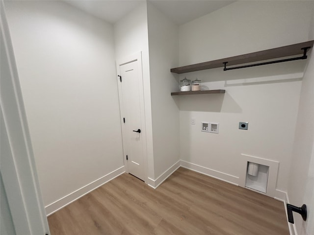 3034 NW Beechwood Dr, Grimes, IA 50111 - laundry area with light wood-type flooring, electric dryer hookup, and hookup for a washing machine