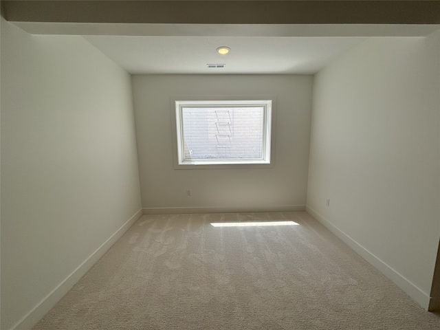 3034 NW Beechwood Dr, Grimes, IA 50111 - unfurnished room featuring light carpet and baseboards