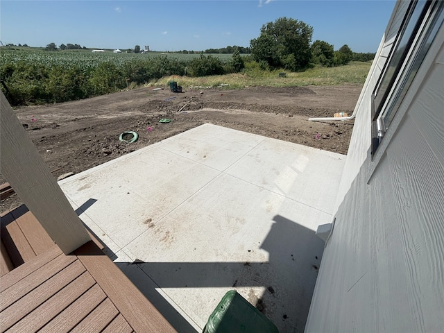 3034 NW Beechwood Dr, Grimes, IA 50111 - exterior space featuring a view of rural / pastoral area and a patio