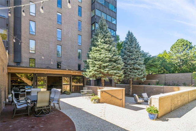 view of home's community featuring a patio