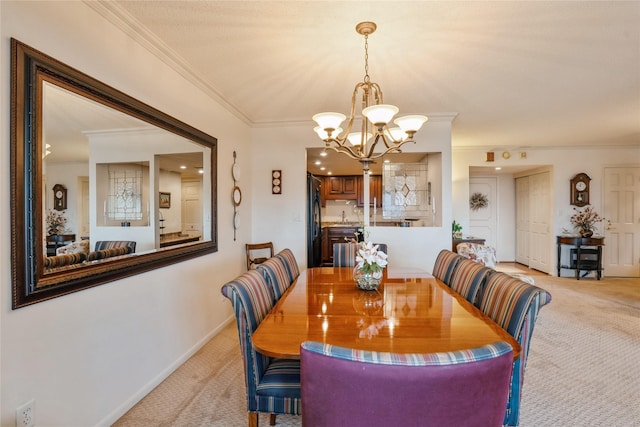 carpeted dining area featuring a chandelier and ornamental molding