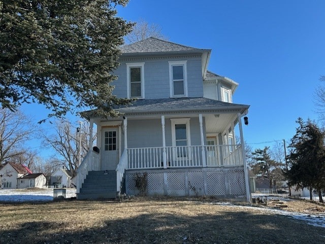 view of front of home featuring covered porch