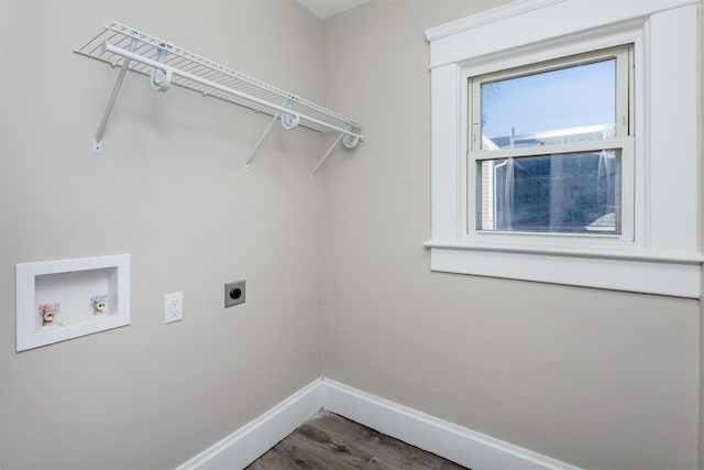 laundry area featuring hookup for an electric dryer, dark hardwood / wood-style floors, and hookup for a washing machine