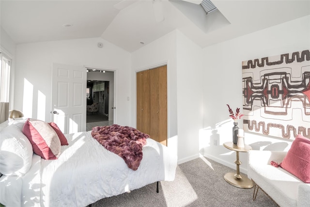 bedroom featuring lofted ceiling, carpet floors, and ceiling fan