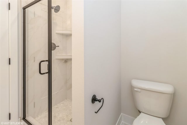 300 NW Ashley Ave, Waukee, IA 50263 - bathroom with a shower stall and toilet