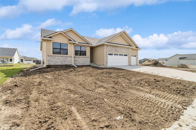 300 NW Ashley Ave, Waukee, IA 50263 - view of front of house featuring concrete driveway and an attached garage