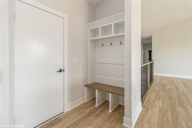 300 NW Ashley Ave, Waukee, IA 50263 - mudroom featuring baseboards and light wood-type flooring