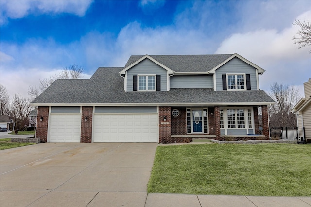 traditional-style home with a garage, brick siding, a shingled roof, driveway, and a front yard