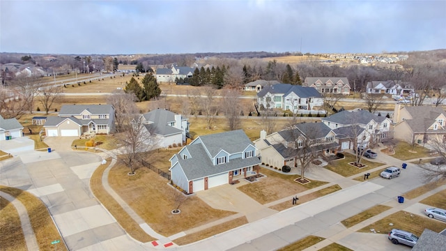 birds eye view of property with a residential view