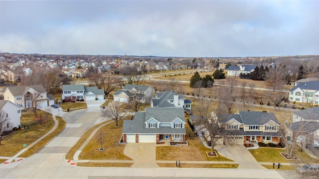 birds eye view of property with a residential view