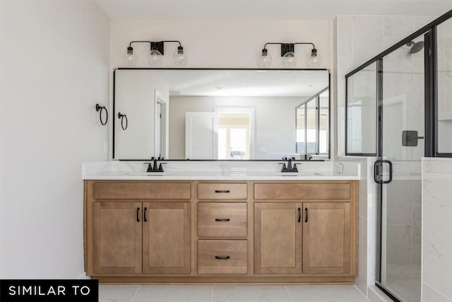 bathroom featuring a shower with door, tile patterned floors, and vanity