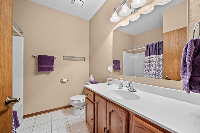 bathroom with vanity, toilet, tile patterned floors, and a shower with curtain