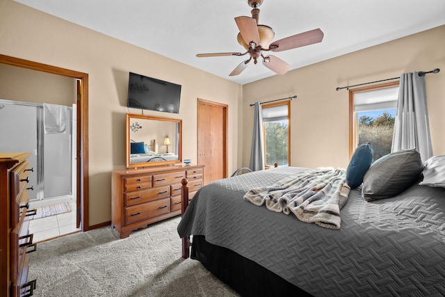 bedroom with ceiling fan and carpet flooring