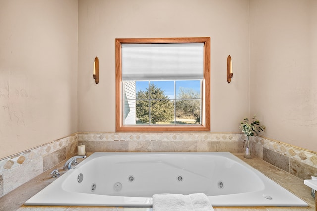 bathroom with tiled tub