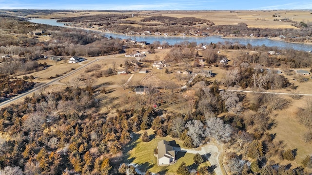 drone / aerial view featuring a water view and a rural view