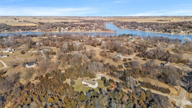 drone / aerial view featuring a water view and a rural view