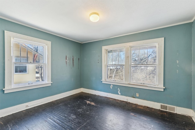 spare room featuring ornamental molding