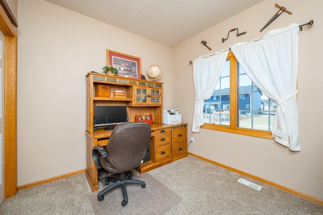 view of carpeted home office