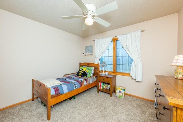 bedroom with ceiling fan and carpet