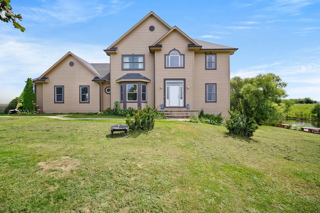 view of front facade with a front yard