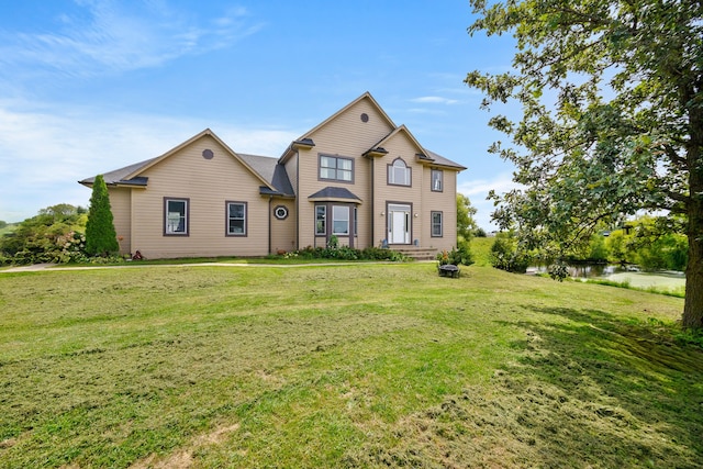 view of front of home with a front yard