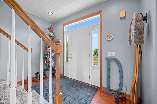 foyer with wood-type flooring