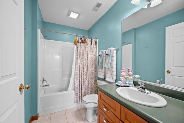 full bathroom featuring vanity, toilet, tile patterned floors, and shower / bath combo