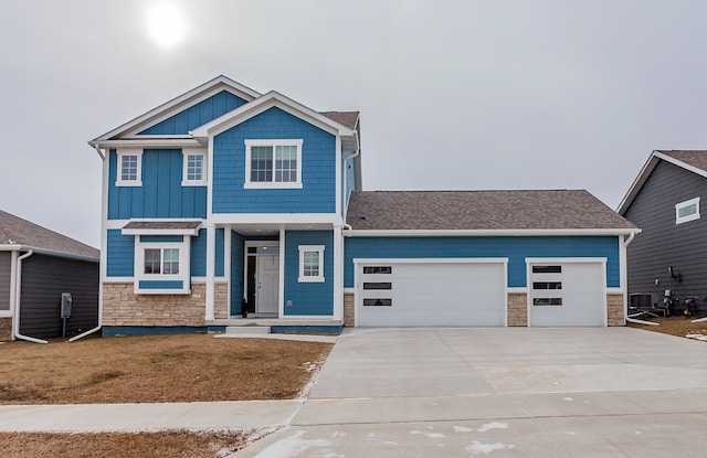 craftsman house with a garage