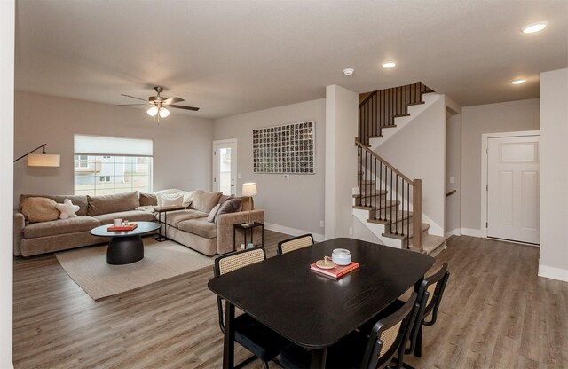 dining room featuring hardwood / wood-style flooring and ceiling fan