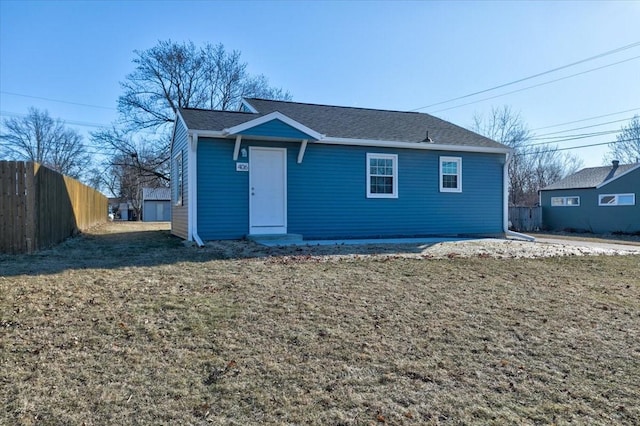 view of front of home with a front lawn