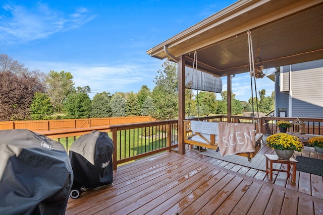 wooden terrace with area for grilling