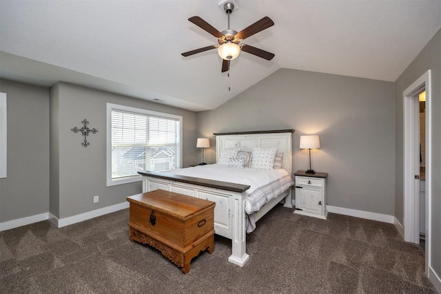 carpeted bedroom with ceiling fan and vaulted ceiling