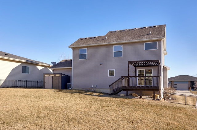 rear view of property with a wooden deck, a storage unit, a lawn, and a pergola