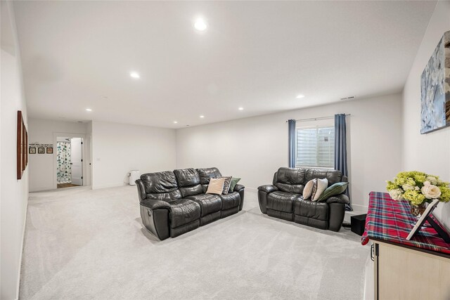 living room with light colored carpet