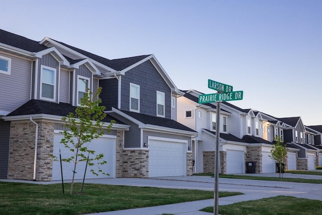 townhome / multi-family property featuring a garage