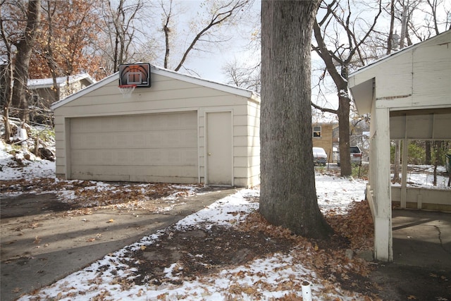 view of snow covered garage