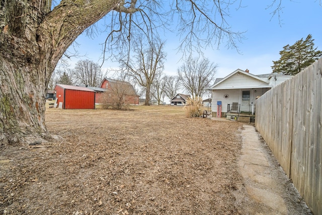 view of yard featuring covered porch