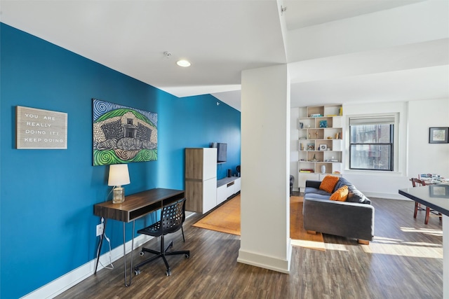 home office with hardwood / wood-style floors