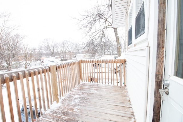 view of snow covered deck