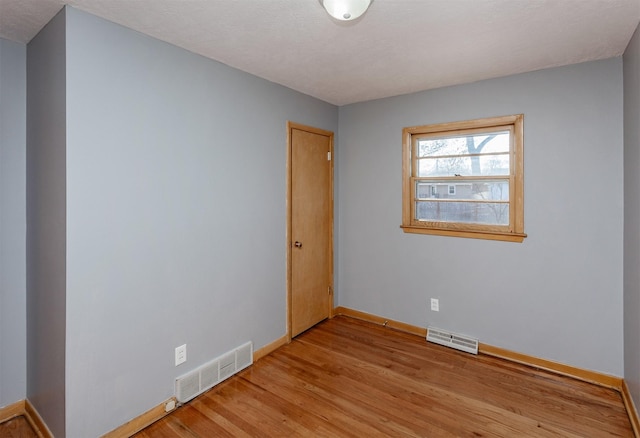 empty room featuring light wood-type flooring