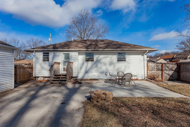 rear view of house with a patio