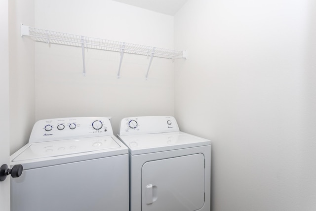 laundry area with washer and clothes dryer