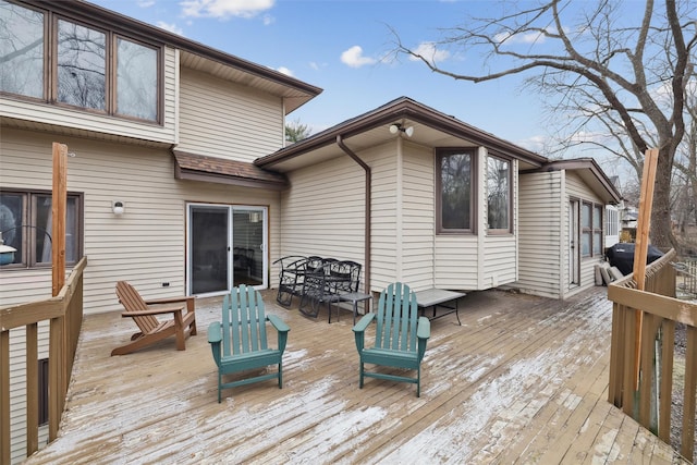 deck with outdoor dining area and area for grilling