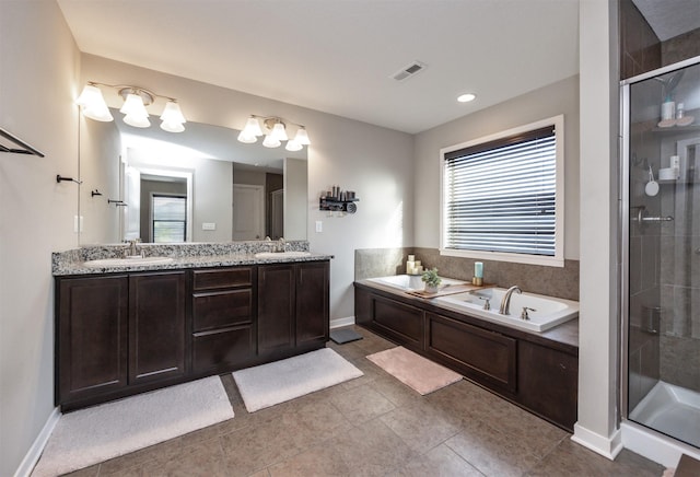 full bath featuring a sink, visible vents, a bath, double vanity, and a stall shower