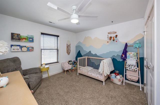 bedroom with baseboards, ceiling fan, visible vents, and carpet flooring