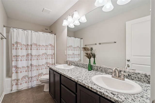 16924 Prairie Dr, Clive, IA 50325 - bathroom featuring double vanity, tile patterned flooring, and shower / bath combo