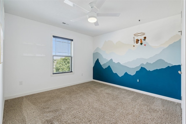 16924 Prairie Dr, Clive, IA 50325 - carpeted empty room featuring baseboards and ceiling fan