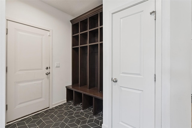 16924 Prairie Dr, Clive, IA 50325 - mudroom featuring baseboards