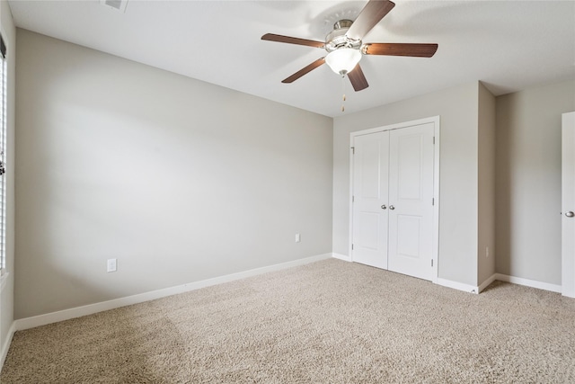 16924 Prairie Dr, Clive, IA 50325 - unfurnished bedroom with a closet, carpet floors, and ceiling fan